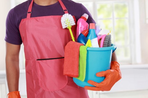 Professional cleaner in Richmond upon Thames cleaning a bright modern home