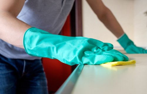 Professional inspection of curtain fabric and lining before cleaning