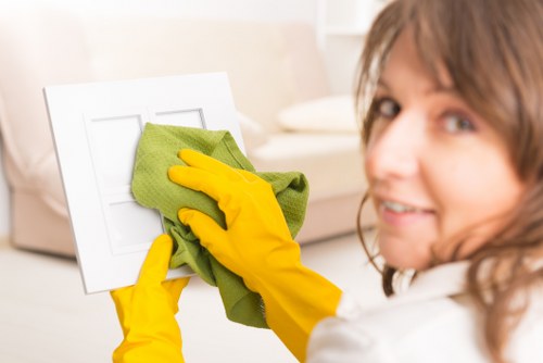 Cleaner working in a period property in Richmond